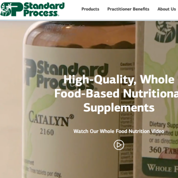 Standard Process supplement bottle with promotional text on nutrition video.