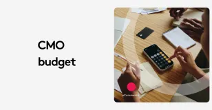 People calculating budget with smartphone calculator and notes in meeting