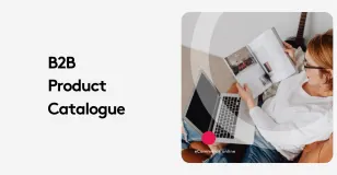 Person browsing B2B product catalogue with laptop and magazine