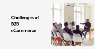 Group discussing B2B eCommerce challenges in a modern office setting.