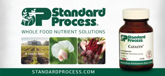 Standard Process supplement bottle with whole food nutrient images.