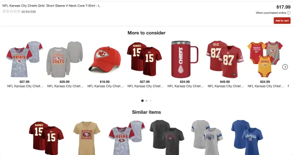 Display of various Kansas City Chiefs merchandise including shirts, hats, and mugs.