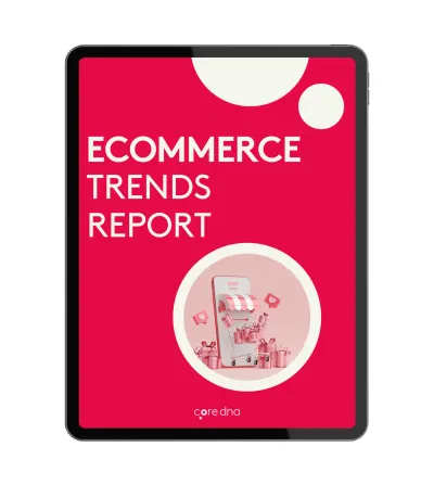 Tablet displaying ecommerce trends report with shopping cart graphic on red background.