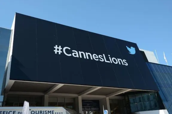 Cannes Lions banner displayed on a building exterior with Twitter logo.