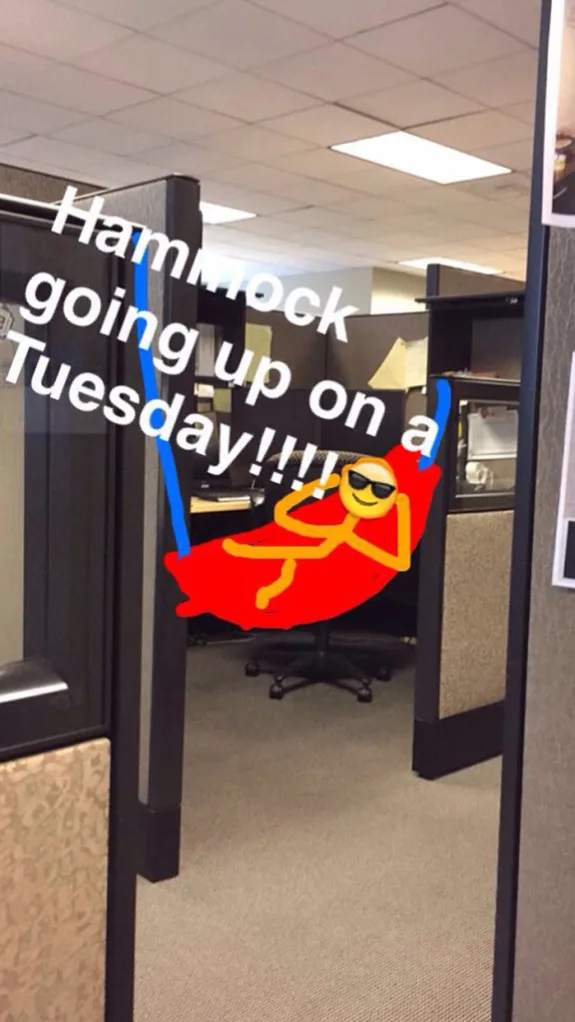 Cartoon figure in hammock inside office cubicle with text overlay.