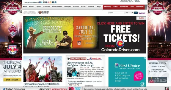 Promotional webpage featuring Kenny Chesney concert, 4th of July fireworks, and ticket offers.
