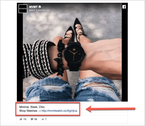 Woman wearing a black wristwatch and ripped denim shorts.