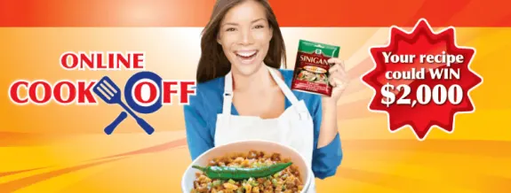 Woman holding Sinigang mix promoting online cook-off contest with $2,000 prize.