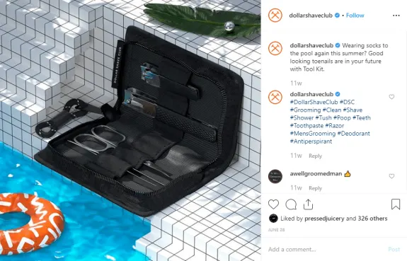 Dollar Shave Club grooming kit by a pool with tiled background.