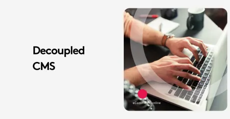 Hands typing on a laptop keyboard with the text 'Decoupled CMS' on the side.