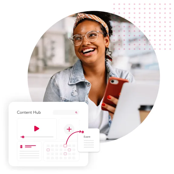 Woman smiling holding a phone in front of a laptop with a content hub graphic.