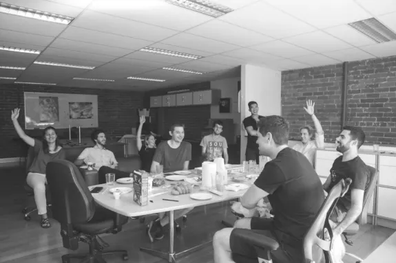 Group of people having a casual meeting in a modern office.